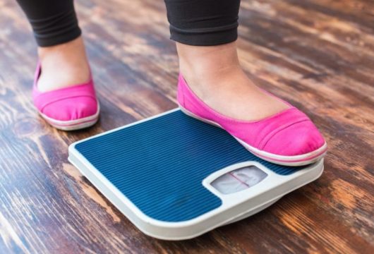 mature-woman-weight-scale-850x548